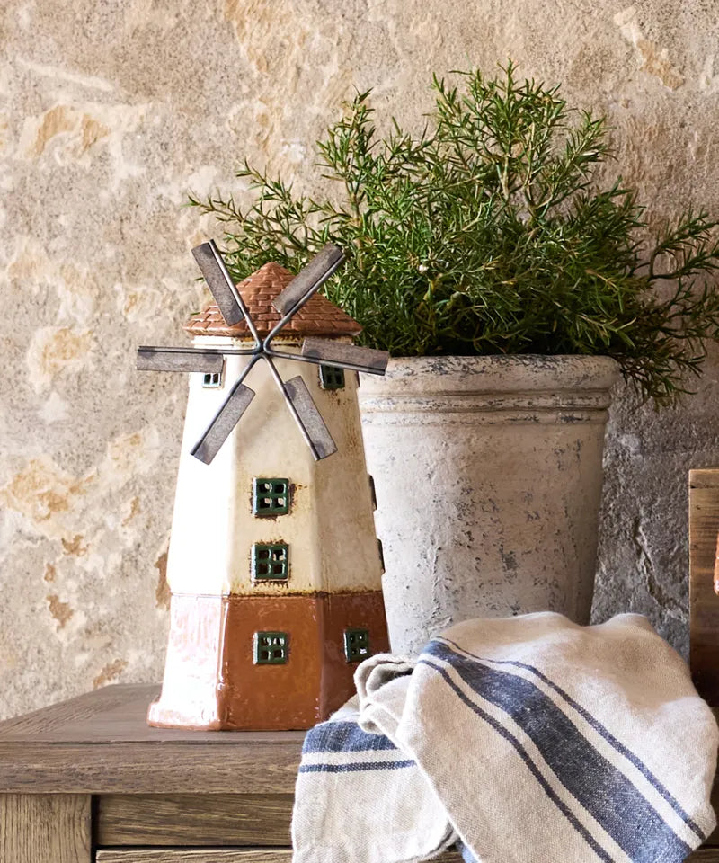 Hand-painted ceramic Cotswolds Country Tea Light Windmill, styled on a table