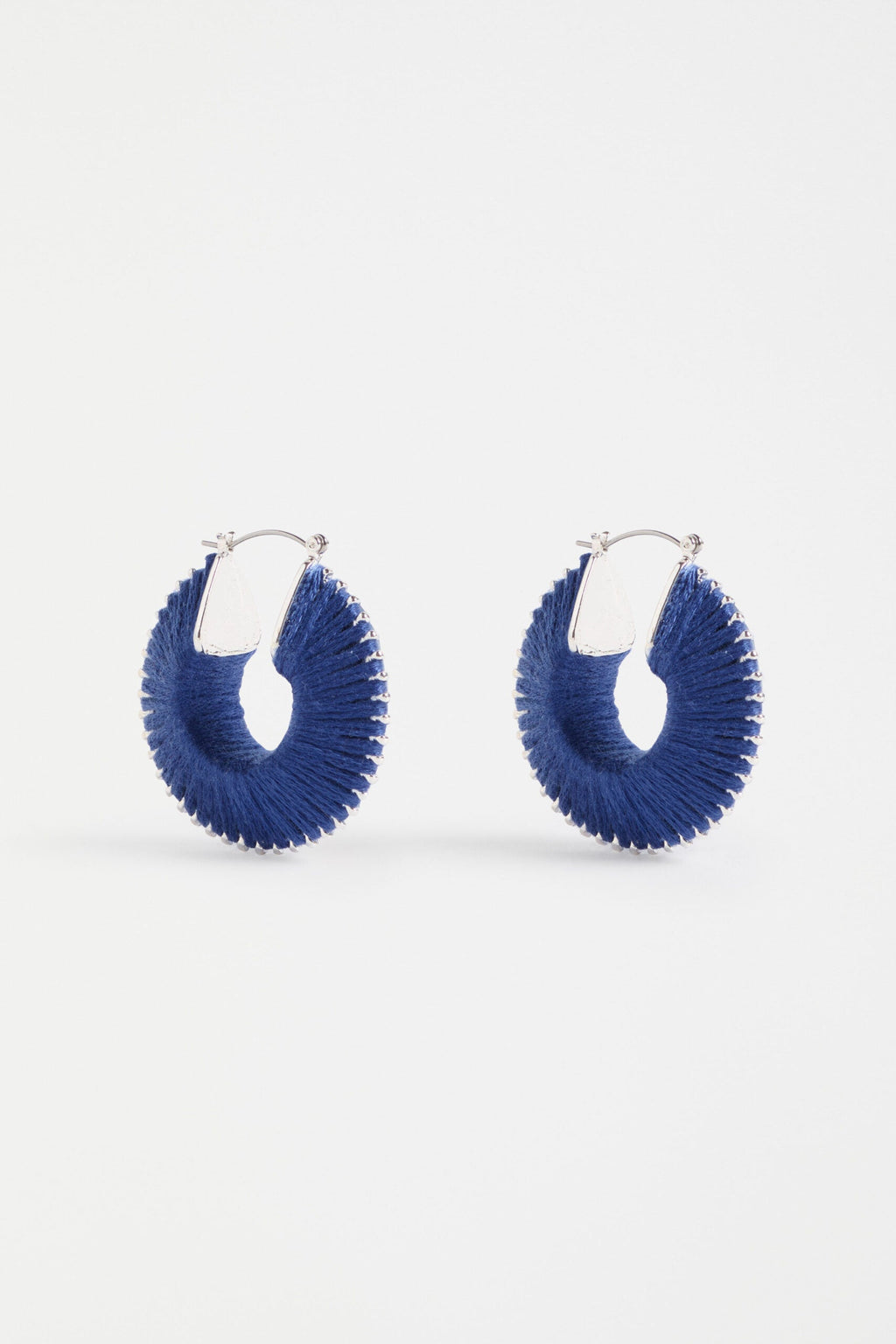 Ledde Hoop Earrings — thread-wrapped brass hoops with colourful sunray detail