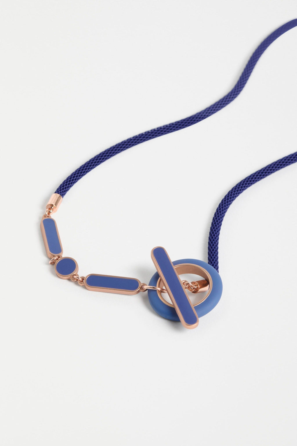 Emal Necklace with enamel geometric shapes and gold metal detailing