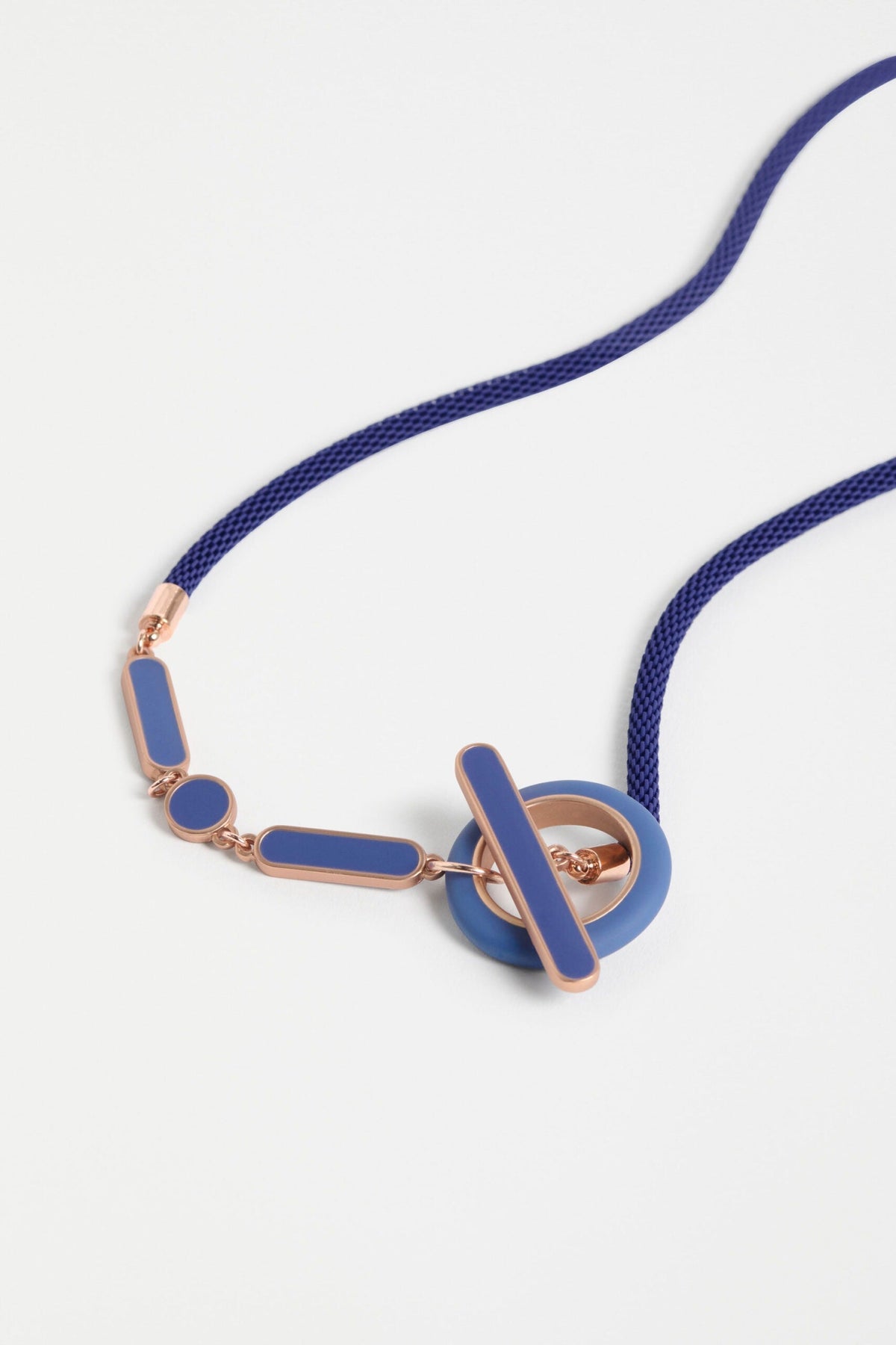 Emal Necklace with enamel geometric shapes and gold metal detailing