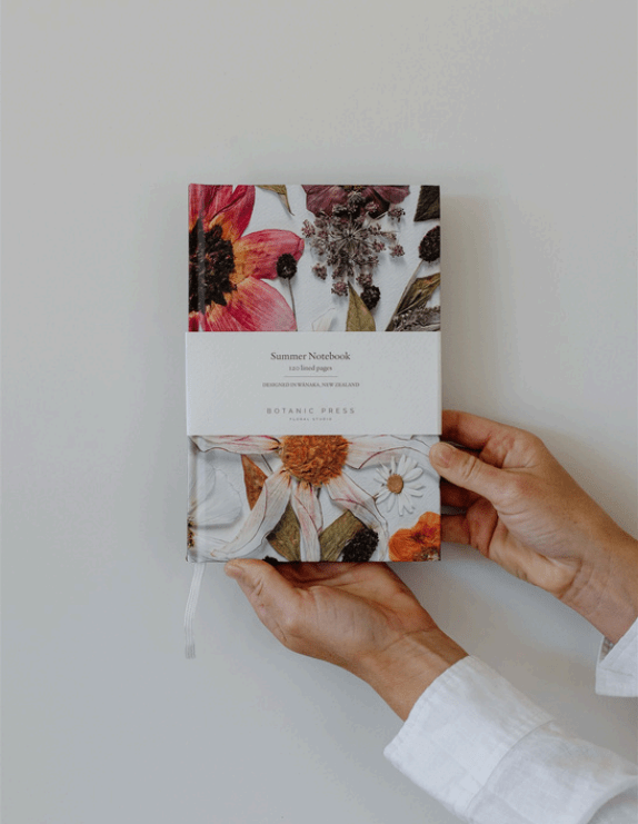 The Summer Garden Lined Notebook is an A5 notebook featuring an original Summer Garden pressed floral composition.