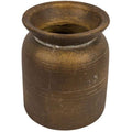 Aged terracotta vessel in neutral, earthy tones